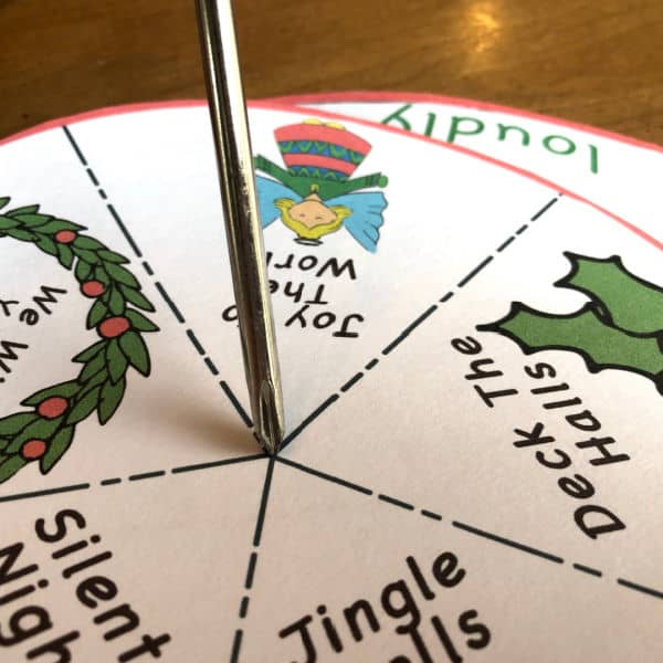 how to combine the Printable Christmas Song Spinner Game