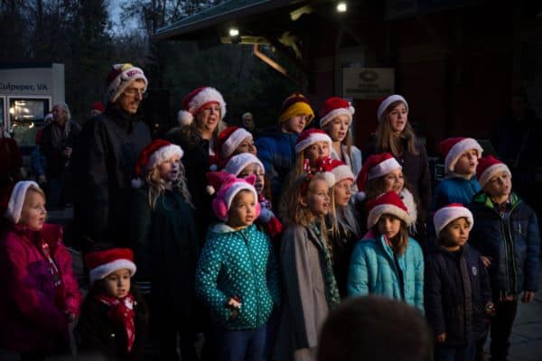 how to have a Christmas Caroling party