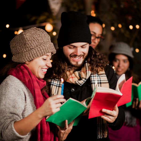 how to have a Christmas Caroling party