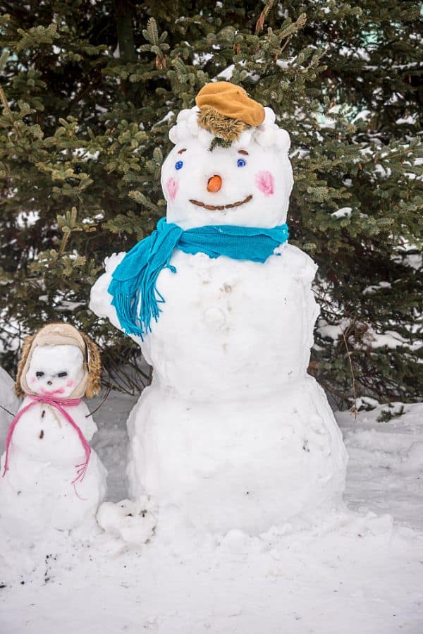 large snowman and a tiny snowman