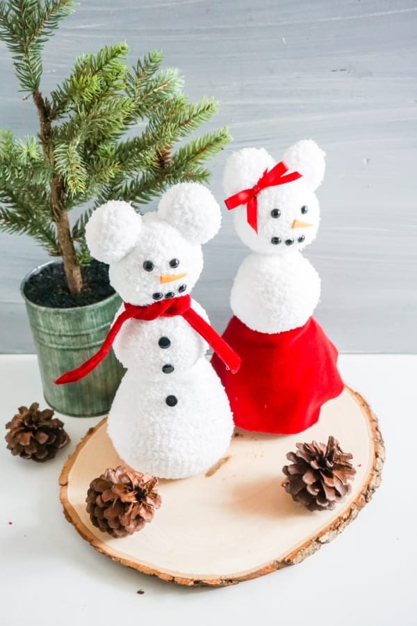 snowmen made from white fuzzy socks