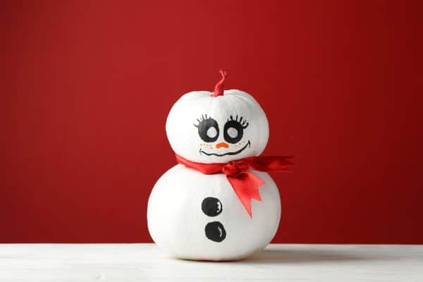 snowman made with pumpkins and painted