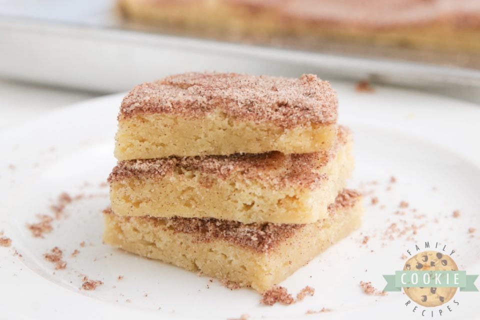 stack of snickerdoodles on a white plate