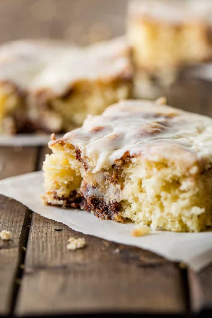 close up of a slice of cinnamon roll cake