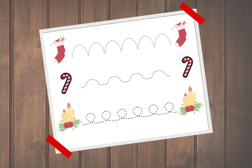 Christmas sock, candy cane and candles on a line tracing sheet