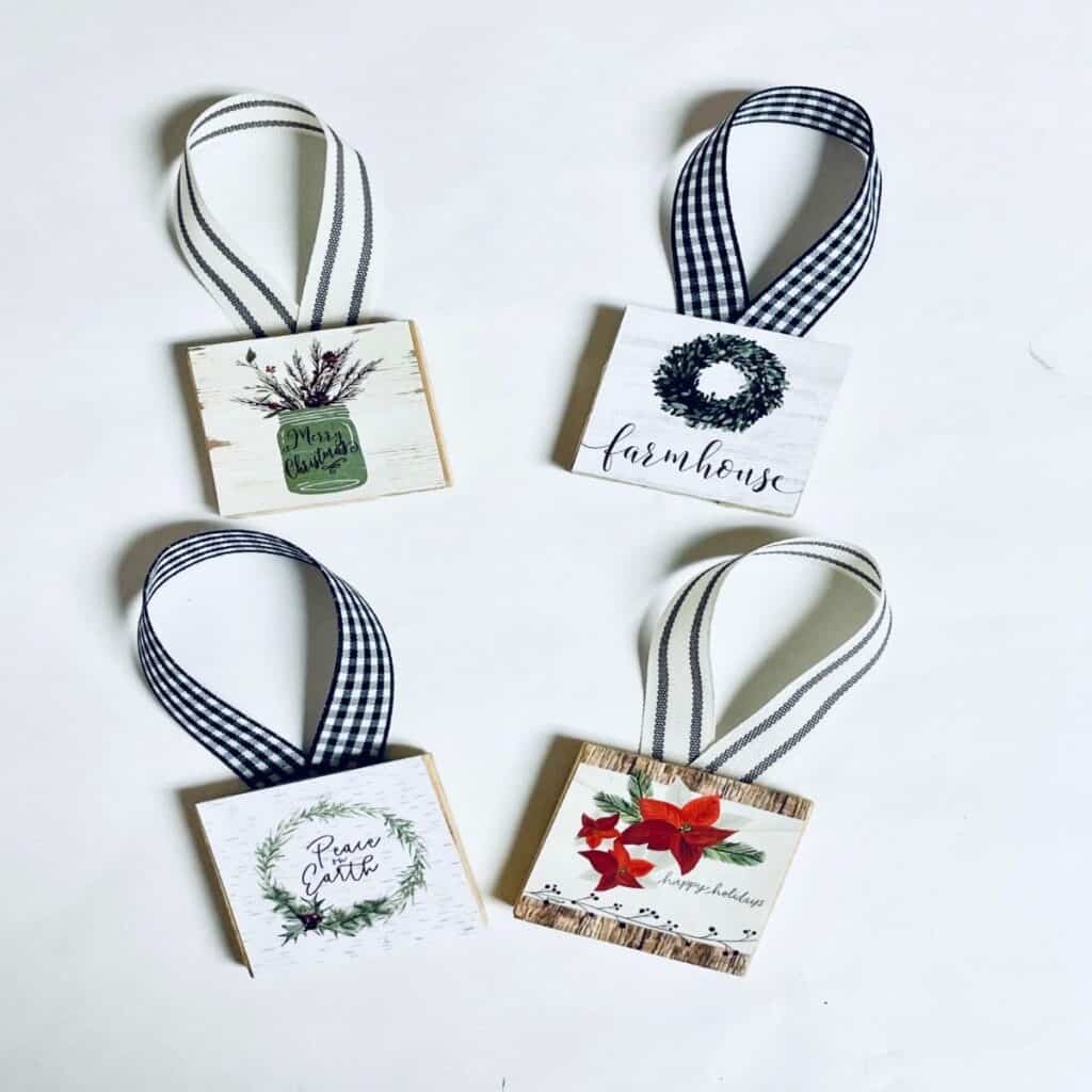 4 jenga ornaments with ribbons