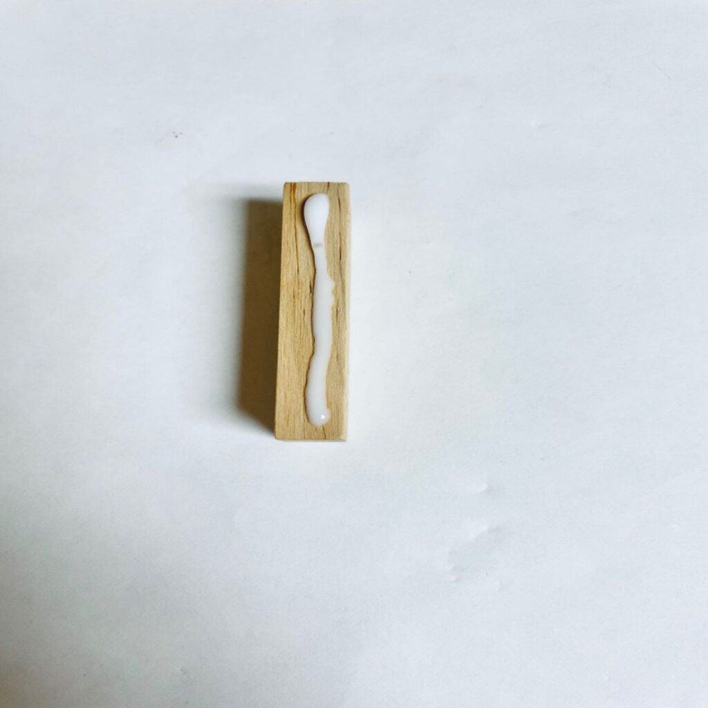 wood glue on a jenga piece