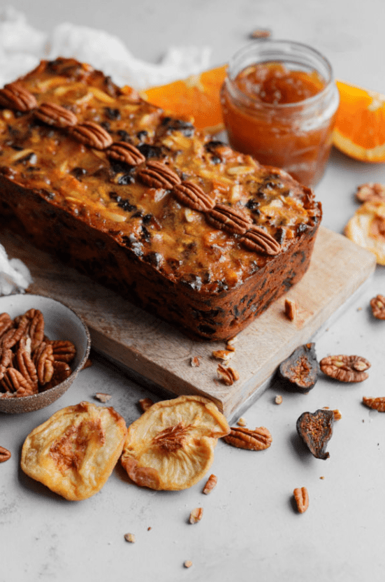 Rectangular classic fruit cake with walnuts on top