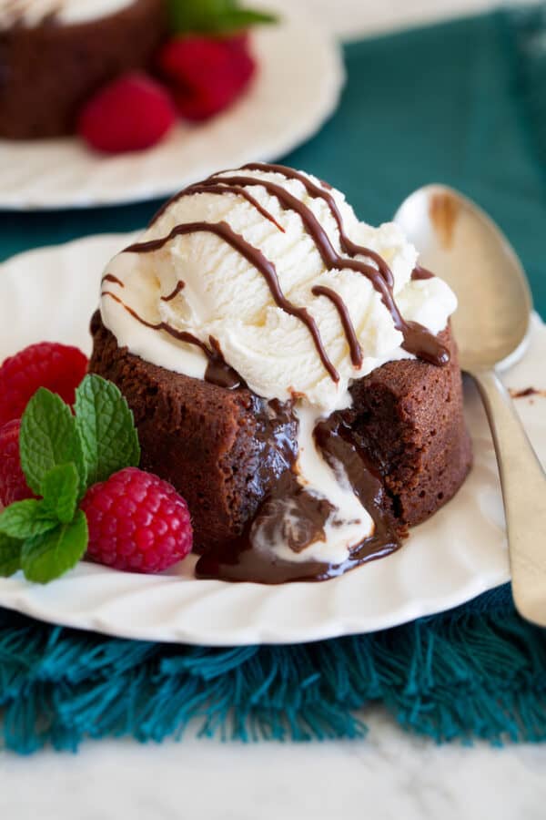 Sliced molten lava cake with berries