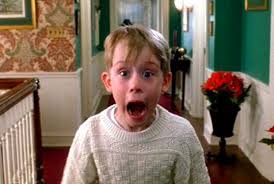 Kevin outsmarts a couple dimwitted burglars in HOME ALONE