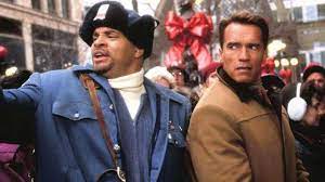 Myron and Howard look for the perfect Christmas gift in JINGLE ALL THE WAY