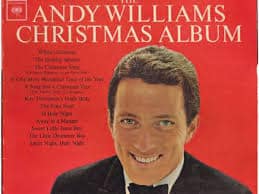 andy williams in a suit and bow tie.